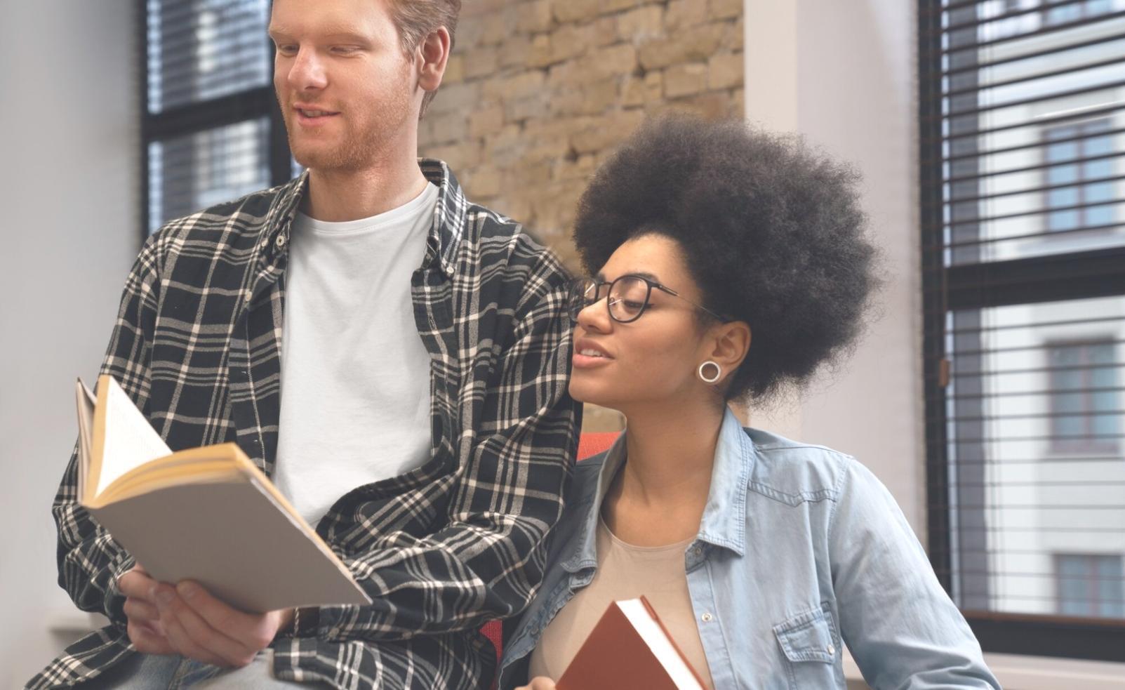 Student reviewing annual budget plans on laptop